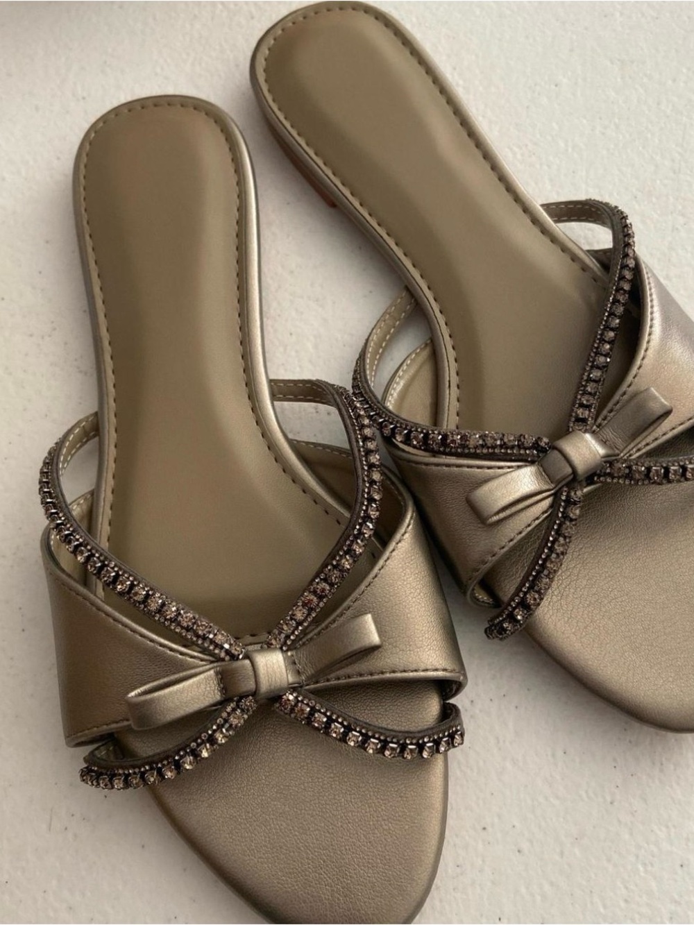Metallic Bow Slide Sandals in Taupe